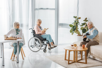 senior people spending time together in nursing home