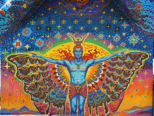 the colorful  little mosaic in angle picture on the wall at wat banrai korat Nahkornrachsrima