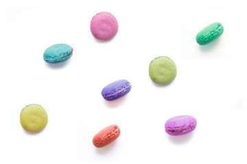 Delicious macaroons on white background