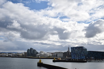 Naklejka premium Reykjavik harbour and Harpa Concert hall building panoramic views in summer. Reykjavik, Iceland