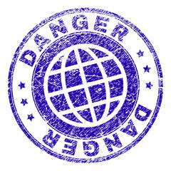 DANGER stamp print with distress texture. Blue vector rubber seal print of DANGER tag with dust texture. Seal has words placed by circle and planet symbol.