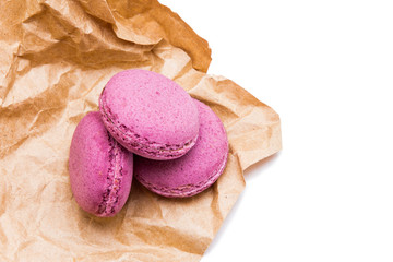 Delicious macaroons on white background