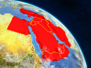 Middle East from space on realistic model of planet Earth with country borders and detailed planet surface and clouds.