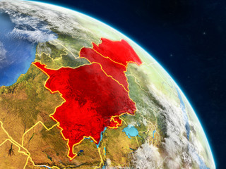 Central Africa from space on realistic model of planet Earth with country borders and detailed planet surface and clouds.