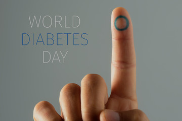 text world diabetes day and man with a blue circle
