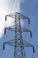 power transmission tower on background of blue sky