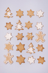 Gingerbread Cookies on Blue Background Fat Lay Composition Christmas Holidays Food Concept Vertical Gingerbread Star