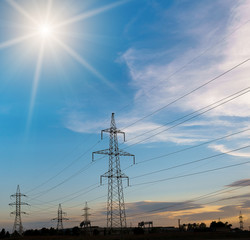 High-voltage power lines. Electricity distribution station. high voltage electric transmission tower. Distribution electric substation with power lines and transformers