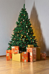 Christmas tree with gifts in colourful boxes