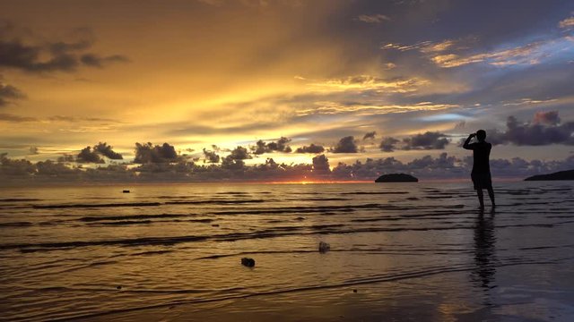 Picturesque Colorful Sunset at Tanjung Aru beach in Kota Kinabalu city.