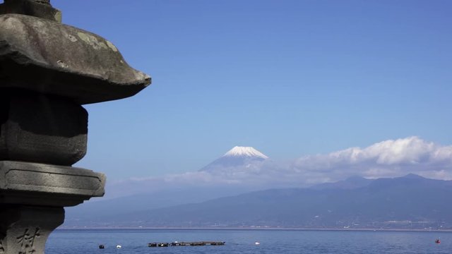 Stone lantern, sea and mt. fuji.