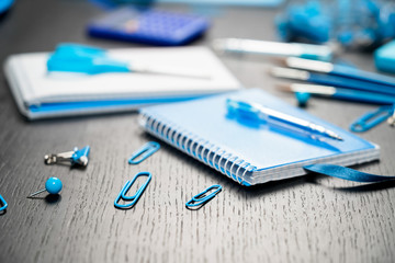 School and office supplies on office table. Male or boyish still life on the topic of school, study, office work.