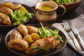 Chicken fillet baked with mozzarella and garlic butter. Served with roasted potatoes.