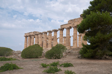 Fototapeta na wymiar Selinunte, Italy - September 02, 2018: View of the Temple of Hera (Temple E)