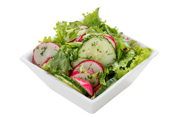 Salad with greens, radish and cucumber. On a white background