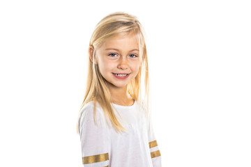 A Cute girl 5 year old posing in studio