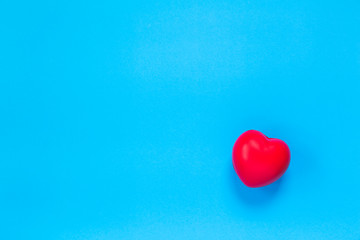 red heart on blue background