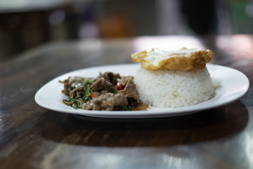 Rice with stir-fried beef and basil. (thai street food)