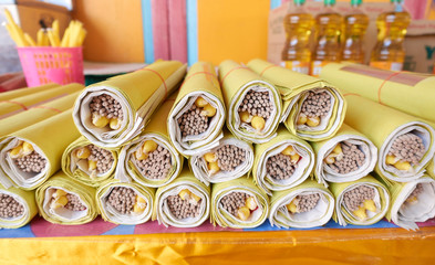 Group of candles, incense and gold combined