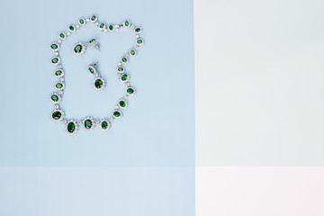 Beautiful necklace and earrings with green stones