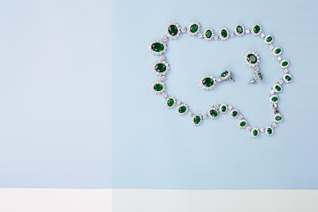 Beautiful necklace and earrings with green stones