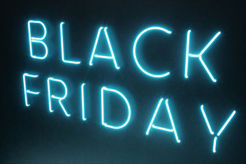 Black Friday - The Most Expected Sale of the Year. Neon blue 3D banner. Grand Discounts. Only once a year, maximum discounts. Sales, joy, success. 3D illustration