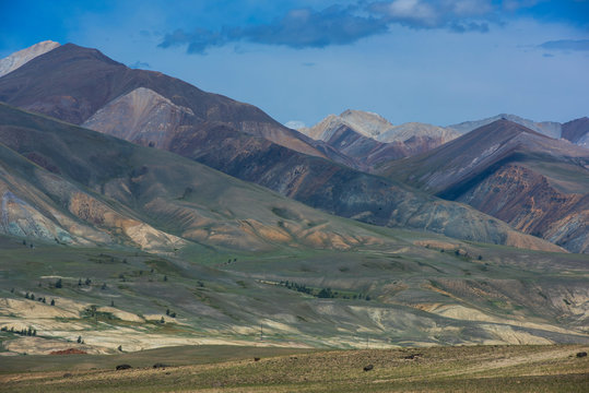 Different colored mountains in near Mongolian Altai mountains, Russia.