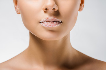 close up of young woman with sugar on lips