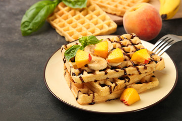 Belgian waffle with peach and banana