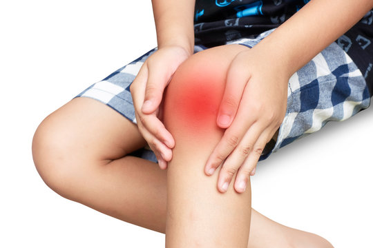 Asian Kid With Knee Pain, Isolated Background