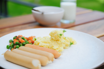 Milk cup, four sausage and nut for healthy breakfast