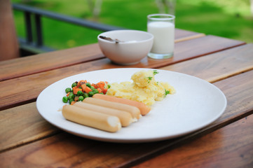 Milk cup, four sausage and nut for healthy breakfast