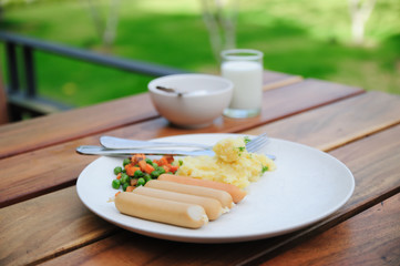 Milk cup, four sausage and nut for healthy breakfast