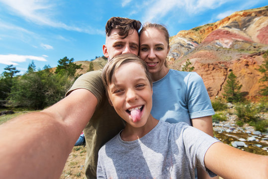 Selfie of family in Altai mountain, beauty summer landcape