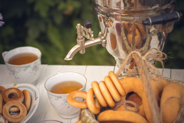 cup of tea with teapot and cup of tea