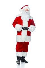 happy santa claus posing in red costume isolated on white