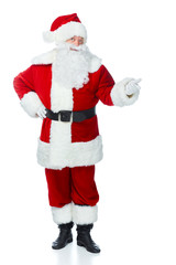 surprised santa claus showing something isolated on white