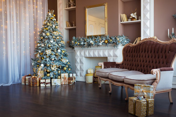 Christmas background. Luxury interior room with fireplace decorated in xmas style. No people. New year tree and gifts