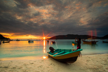 sunrise scenery at perhentian island,malaysia. soft focus,blur due to long exposure.visible noise due to high ISO.