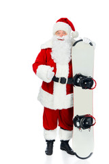 Santa claus with snowboard showing thumb up isolated on white