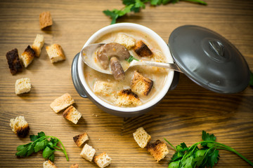 soup puree with mushrooms and croutons in an bowl