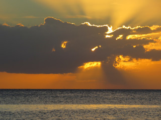 Naklejka na ściany i meble La Romana, Dominican Republic - sunset in the beach of a typical tropical island of the caribbean
