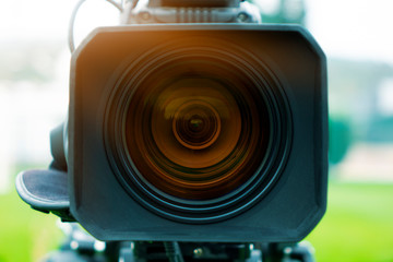 Professional digital video camera. tv camera in a outdoor concert. Digital TV camera.