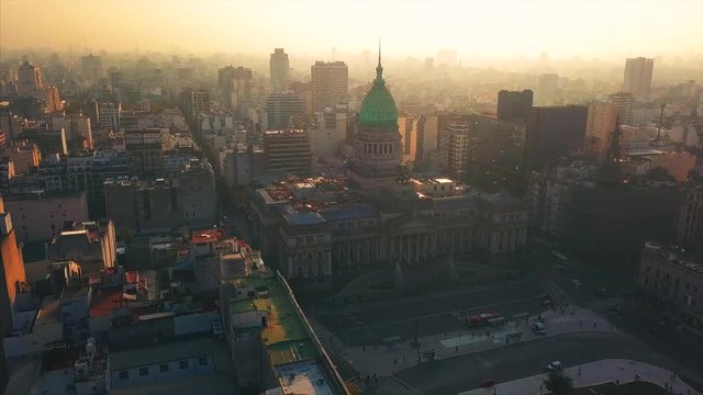 Aerial view the National Congress of Argentina during sunset. Buenos Aires. Camera flies counterclockwise around the Congress building