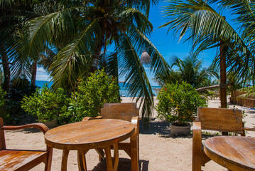 Fototapeta premium Bar table and chair on the beach