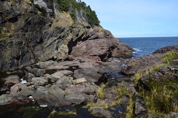 Fototapeta premium andscape along the Killick Coast, coastline near Flatrock seen from the Stiles Cove Path, East Coast trail Avalon Peninsula; Newfoundland Canada