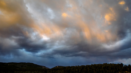 Obraz premium Storm over hills