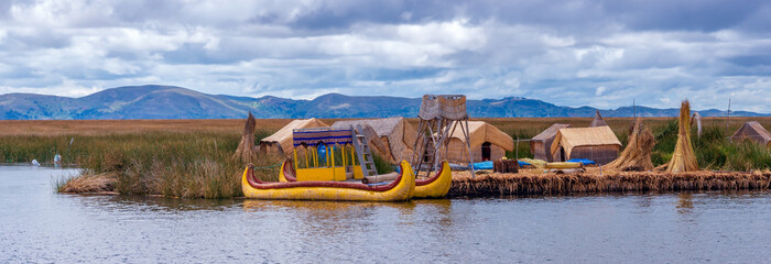 Traditional village on floating islands on lake Titicaca in Peru, South America
