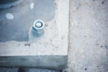Metal rack bolted to concrete