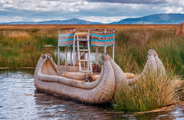 Traditional village on floating islands on lake Titicaca in Peru